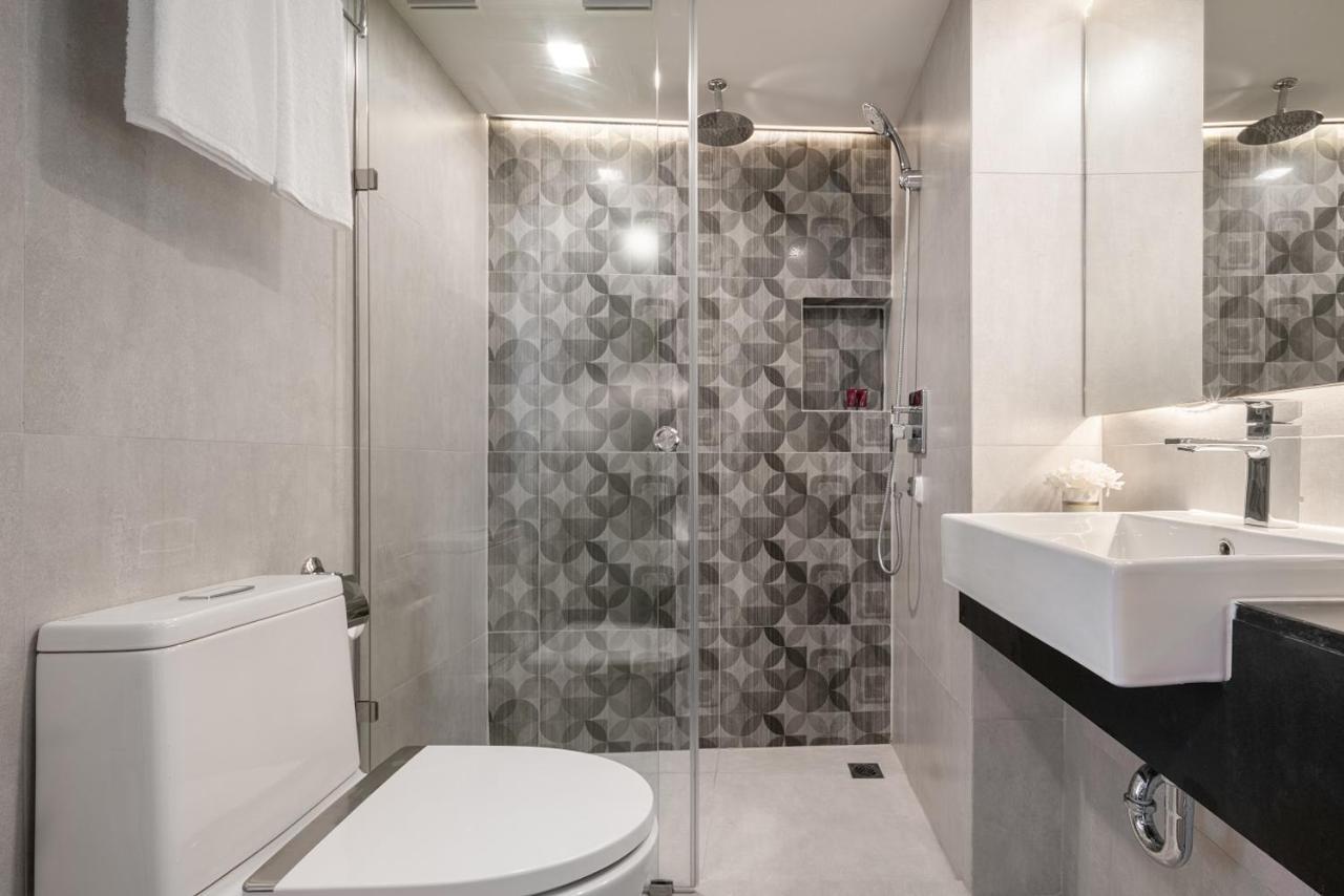 Aspira Gems Center Silom Hotell Bangkok Rum bild