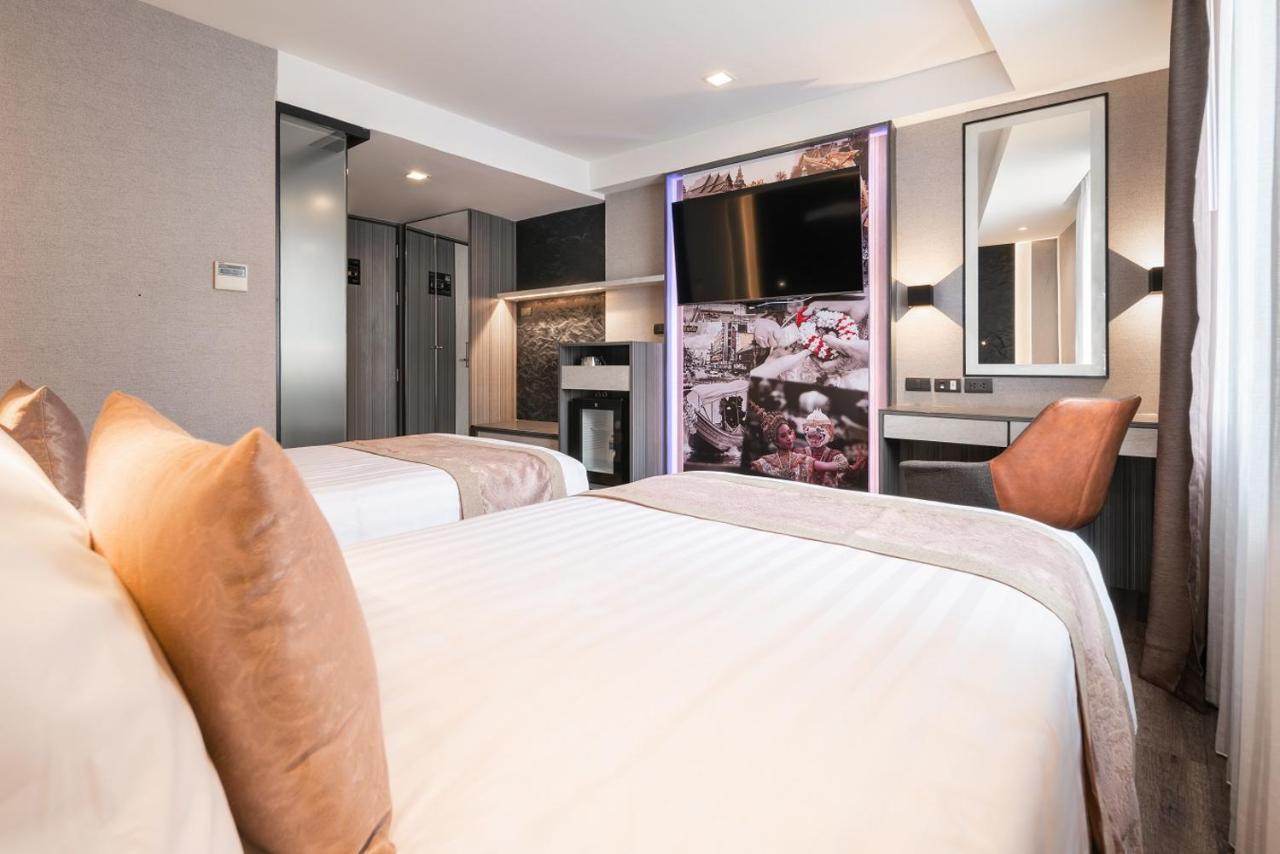Aspira Gems Center Silom Hotell Bangkok Rum bild